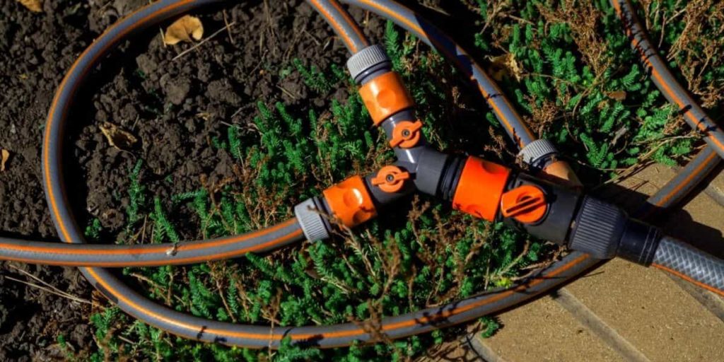 two way hose splitter with two garden hoses connected