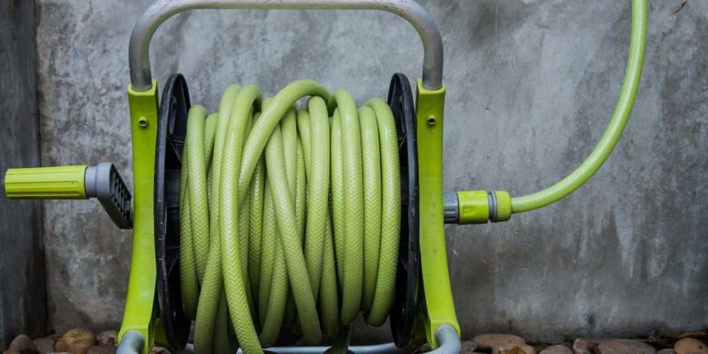 green ground mounted freestanding hose reel holder